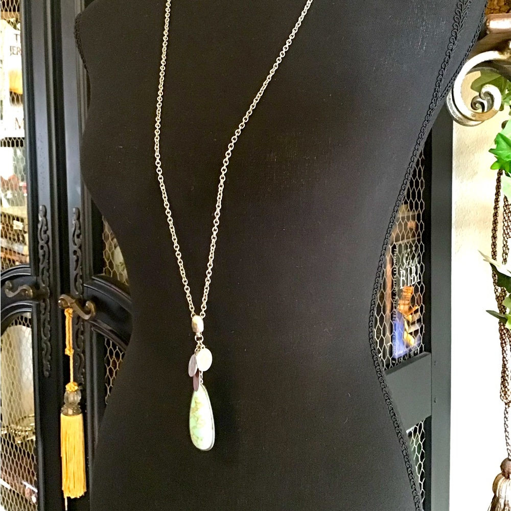 Beautiful long necklace measuring 21in with extender, stone is turquoise